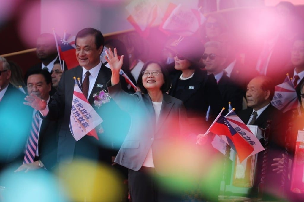 Taiwanese President Tsai Ing-wen (centre) waves to the crowd during National Day celebrations in Taipei, Taiwan, on October 10. Photo: EPA