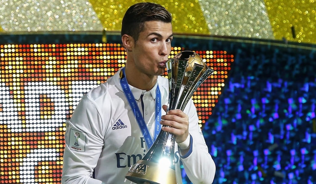 Real Madrid's Cristiano Ronaldo kissing the trophy after their win against Kashima Antlers in the 2016 final. Photo: EPA