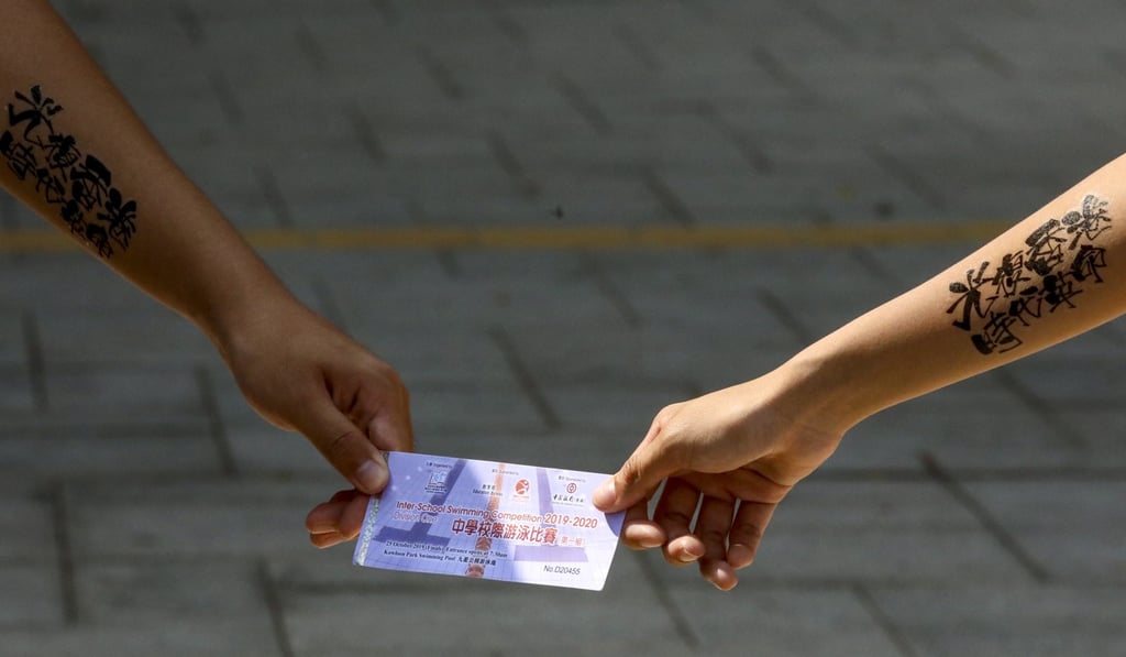 The students said they were warned not to chant political slogans during the swimming competition. Photo: Felix Wong The students said they were warned not to chant political slogans during the swimming competition. Photo: Felix Wong