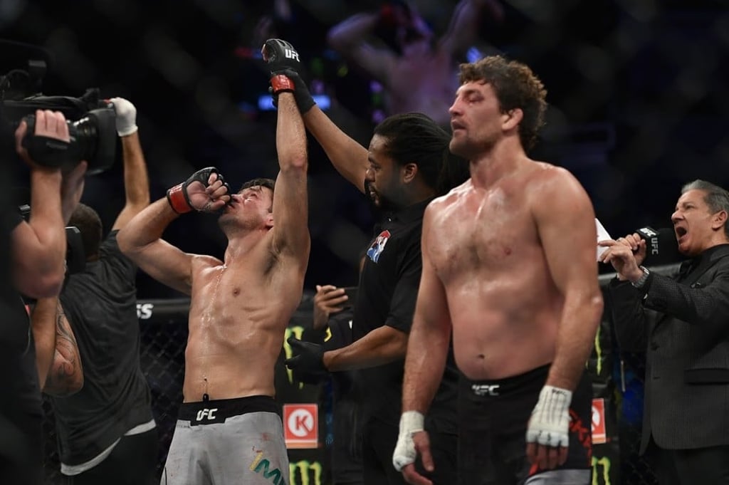 Demian Maia celebrates as Ben Askren looks dejected. Demian Maia celebrates as Ben Askren looks dejected.