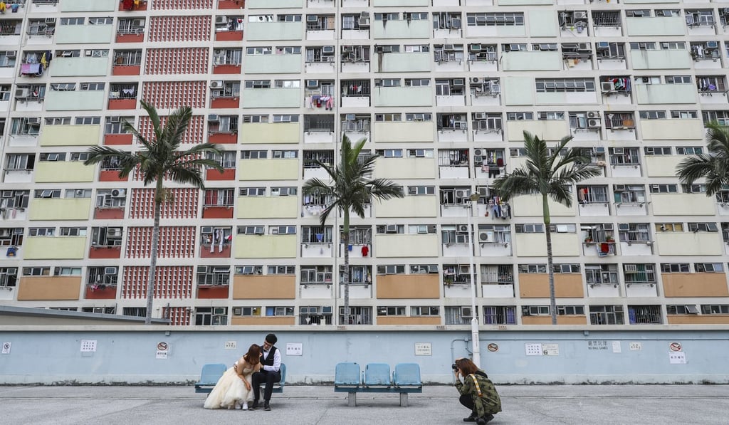 A newly married couple pose for photo at Choi Hung Estate in Hong Kong. Photo: Edmond So