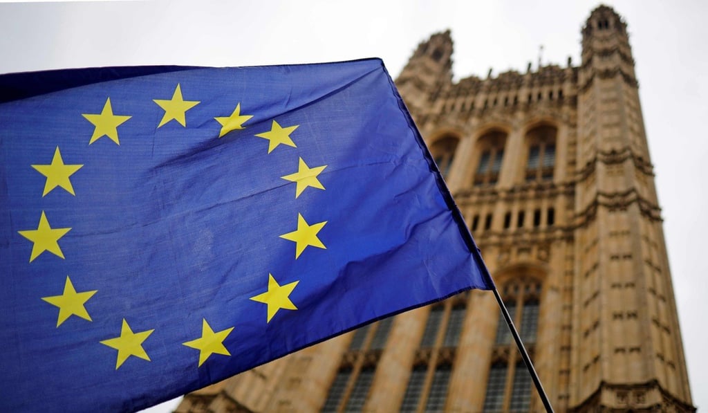 A European Union flag belonging to an anti-Brexit activist flies outside the Houses of Parliament in London on Wednesday. Photo: AFP