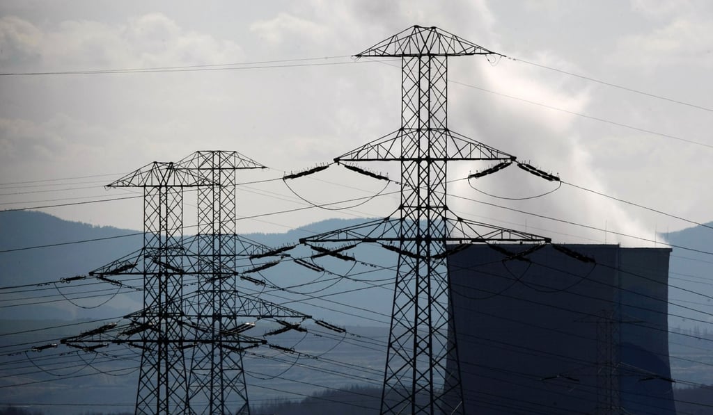 Electricity poles at a power station. Photo: Reuters Electricity poles at a power station. Photo: Reuters