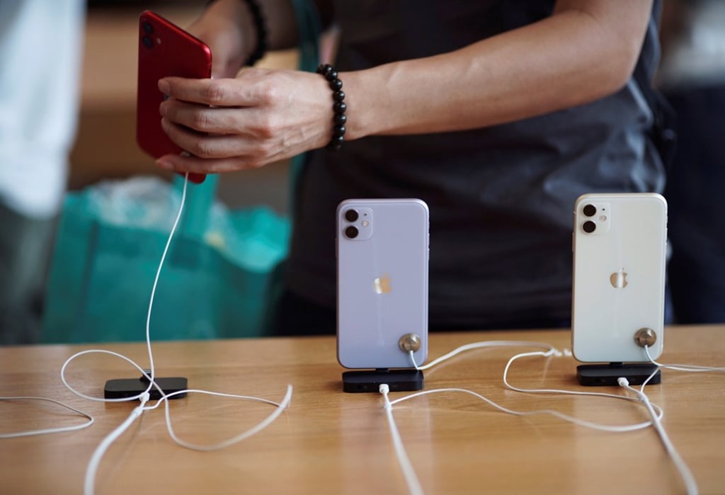 Apple's new iPhone 11 handsets are displayed at the Apple Store in Hong Kong’s IFC Mall. Chief executive Tim Cook said Apple’s services and wearables businesses have been growing in its Greater China market, comprising the mainland, Hong Kong and Taiwan. Photo: Reuters