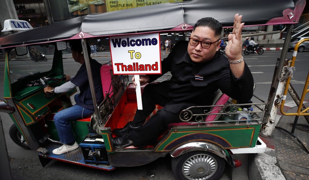 A Thai impersonator of North Korean leader Kim Jong-un outside the Asean summit venue. Photo: EPA