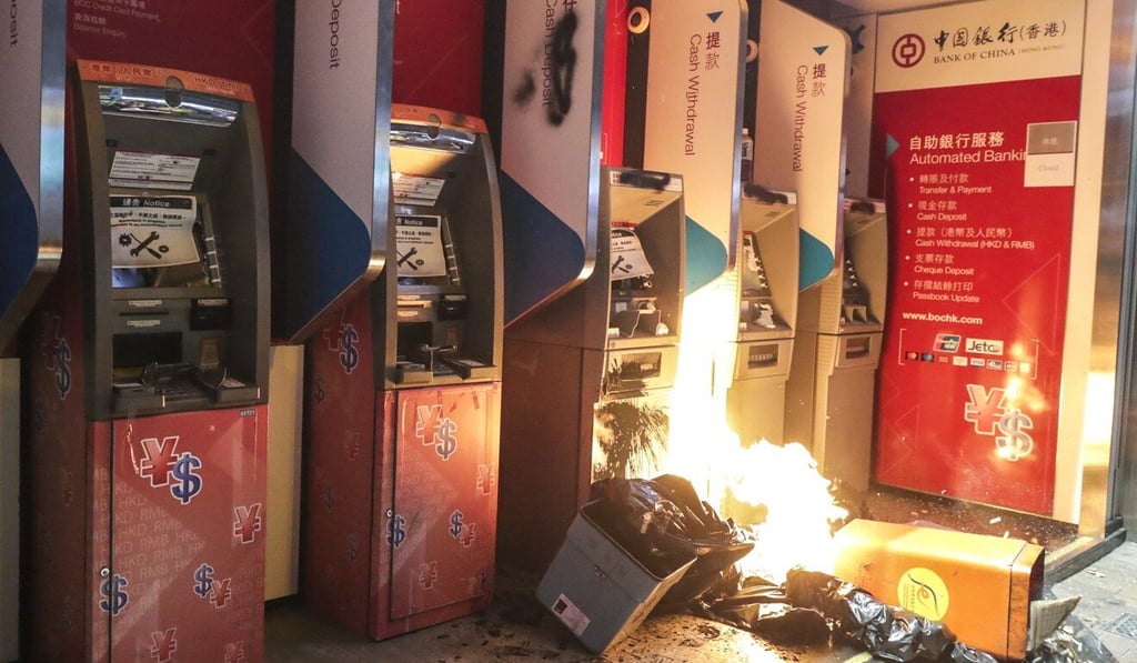 Anti-government protesters have vandalised branches of the Bank of China alongside other businesses they believe have links to the mainland or support police. Photo: Edmond So