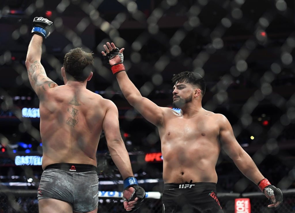Darren Till and Kelvin Gastelum both celebrate after the fight.