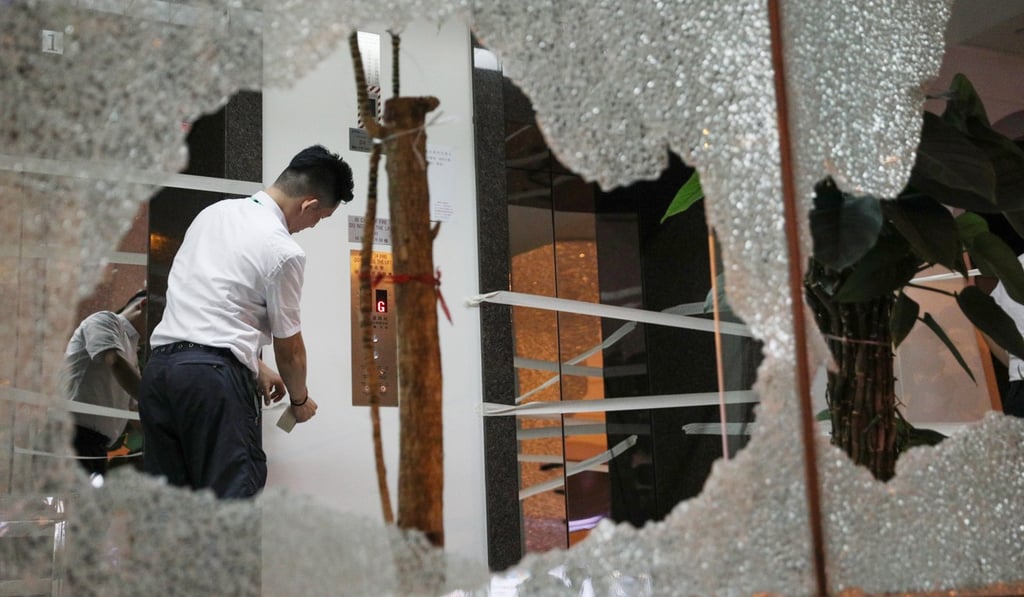 A Xinhua employee said he knew his office was under attack as he could see it on television. Photo: EPA-EFE A Xinhua employee said he knew his office was under attack as he could see it on television. Photo: EPA-EFE