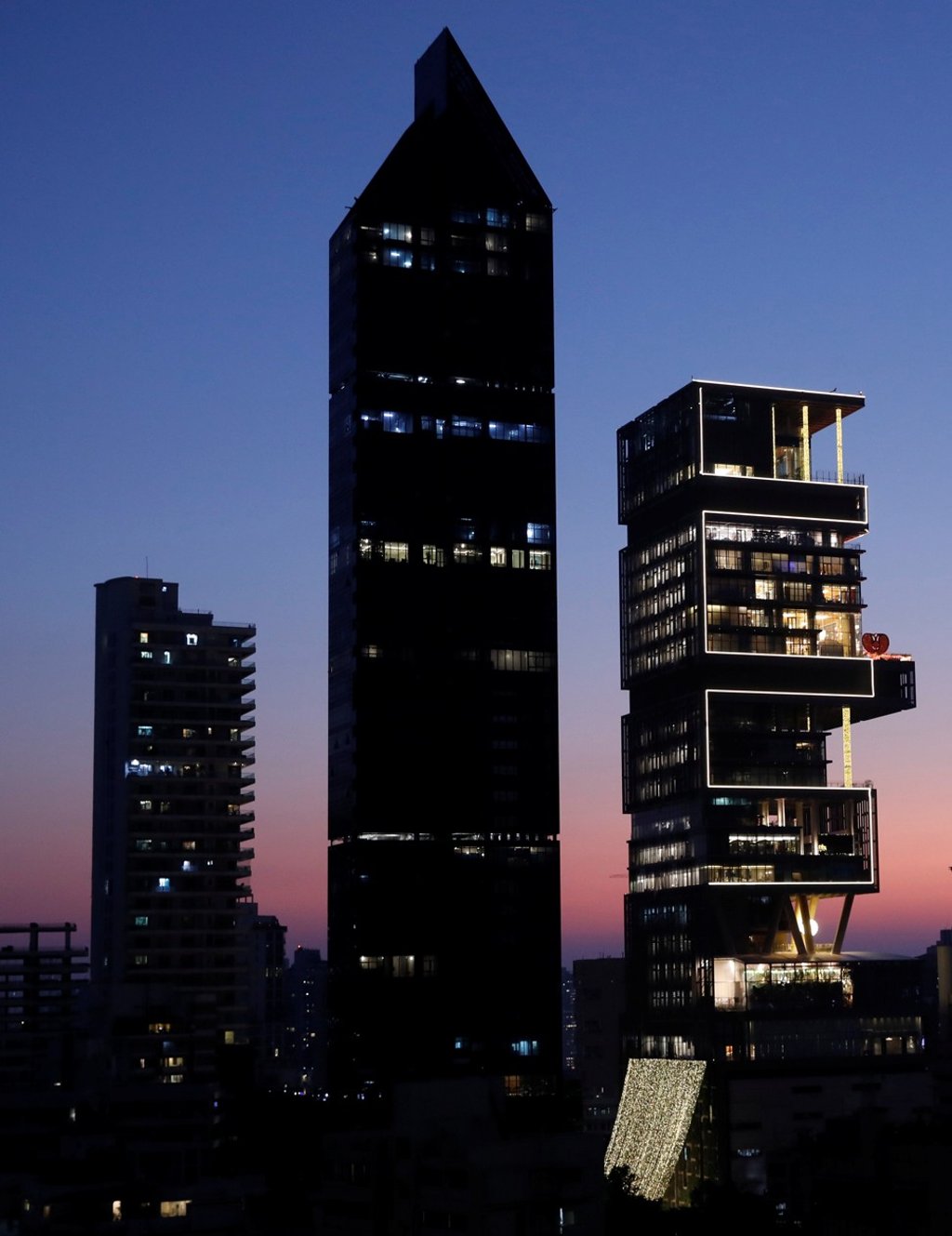 Antilia, the skyscraper home of Reliance Industries chairman Mukesh Ambani, was decorated during his daughter Isha’s wedding, on December 12, 2018. Photo: Reuters