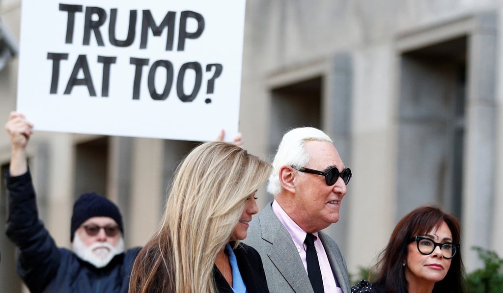 Former adviser to Donald Trump's presidential campaign Roger Stone (second right) and his wife Nydia Stone (right) arrive at federal court in Washington on Tuesday. Photo: Reuters