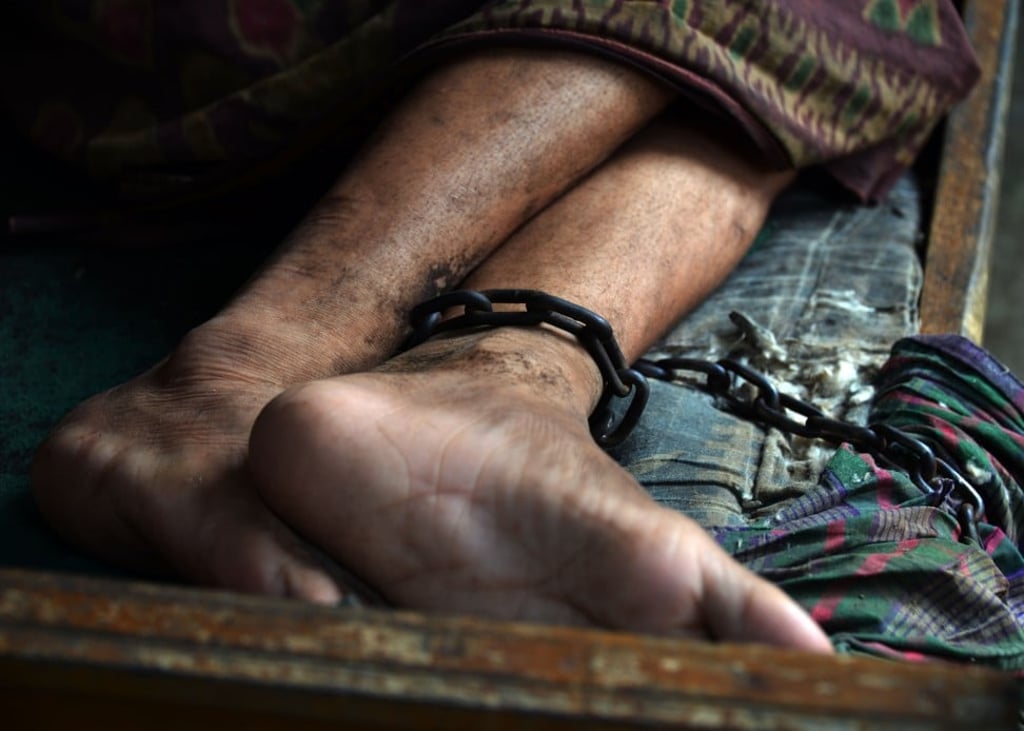 Chains are often used to restrain mentally ill patients living at home and in rehabilitation houses in Indonesia. Photo: AFP