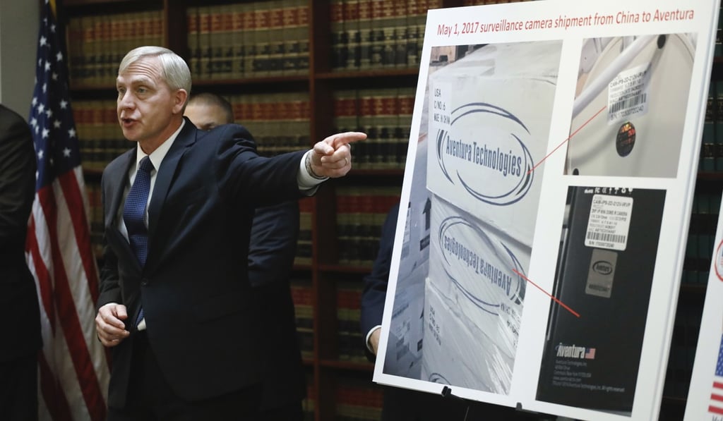 US Attorney Richard Donoghue announces charges against Aventura Technologies in New York on Thursday. Photo: AP US Attorney Richard Donoghue announces charges against Aventura Technologies in New York on Thursday. Photo: AP