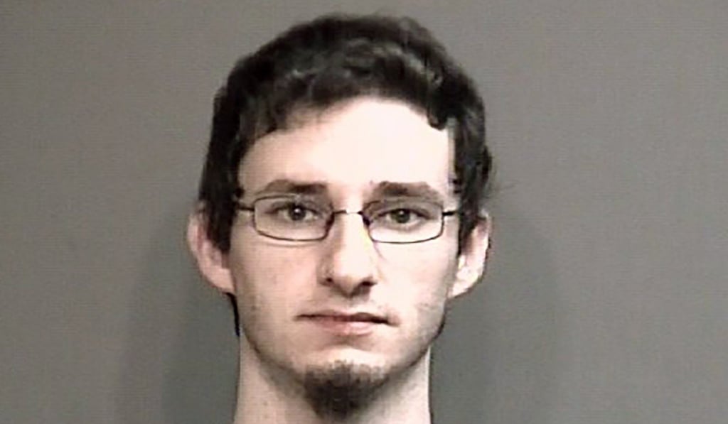 Joseph Elledge was charged in October with abuse or neglect of a child as authorities continue searching for his wife, Menqi Ji Elledge. Photo: Boone County Sheriff's Department via AP Joseph Elledge was charged in October with abuse or neglect of a child as authorities continue searching for his wife, Menqi Ji Elledge. Photo: Boone County Sheriff's Department via AP