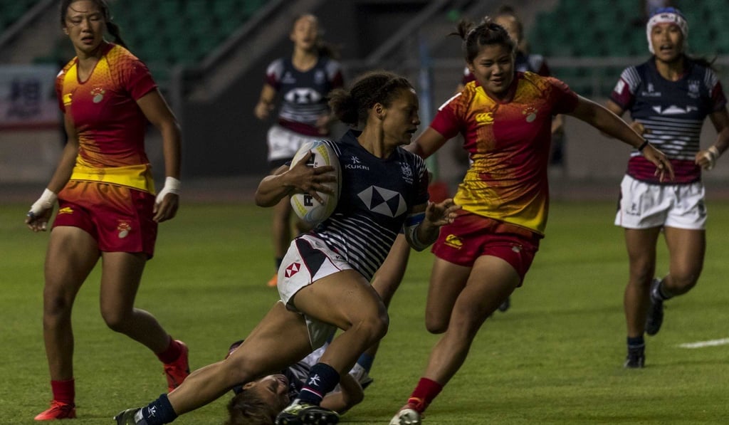 Natasha Olsen-Thorne tries to elude the China defence.