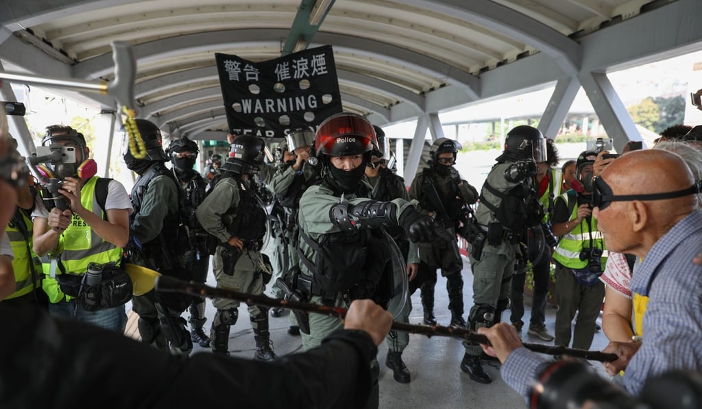 Lee cited Hong Kong’s ongoing unrest to illustrate how people have lost faith in institutions. Photo: EPA
