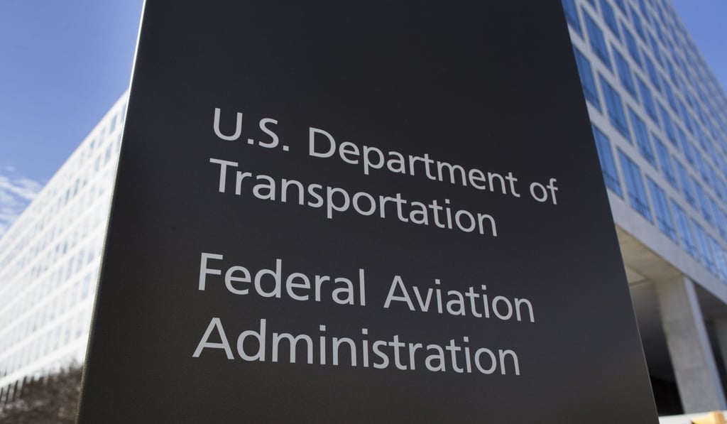 A sign is seen outside the headquarters of the FAA in Washington. Photo: EPA