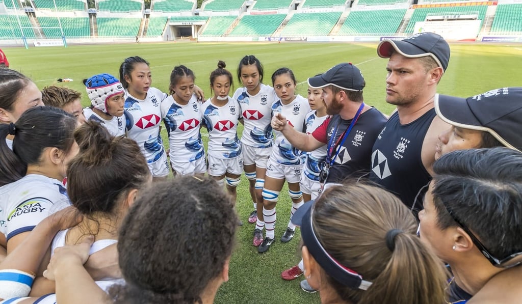 Iain Monaghan talks to his players after their loss to China. Photo: HKRU Iain Monaghan talks to his players after their loss to China. Photo: HKRU