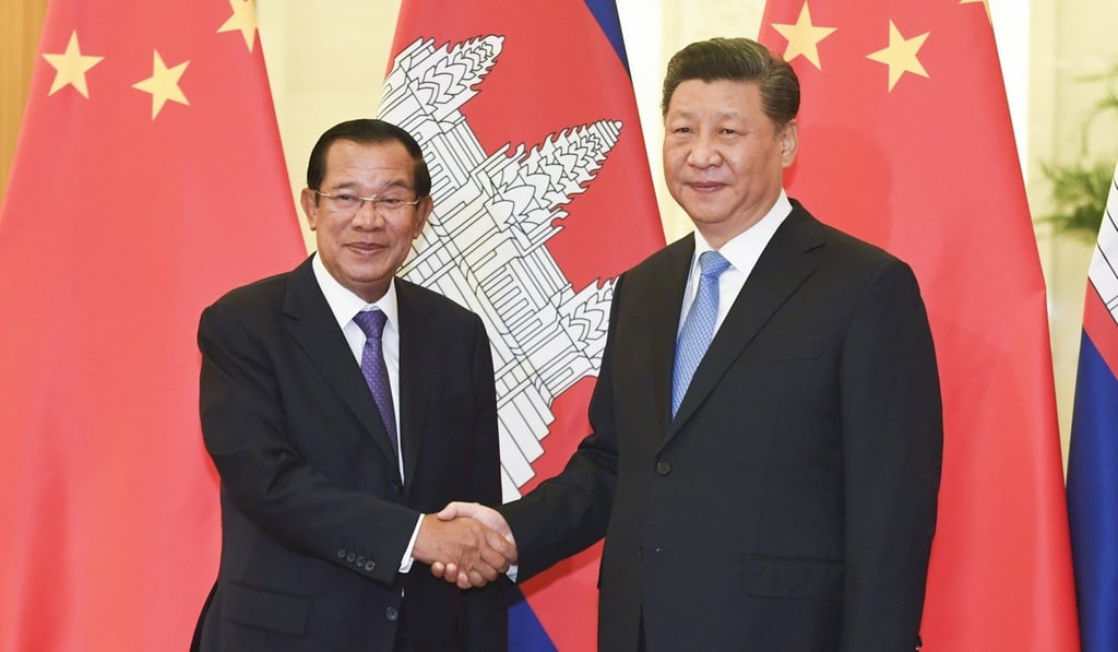 Cambodian PM Hun Sen, left, and Chinese President Xi Jinping shake hands at the Great Hall of the People in April 2019. Photo: Kyodo