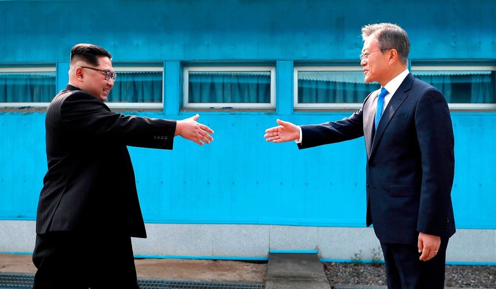 North Korean leader Kim Jong-un meets South Korean President Moon Jae-in at the Demilitarised Zone. The pair have held three one-on-on summits. Photo: AP