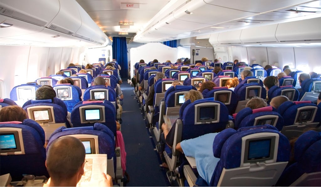 Try to get an aisle seat or exit row seat. Photo: Alamy Try to get an aisle seat or exit row seat. Photo: Alamy