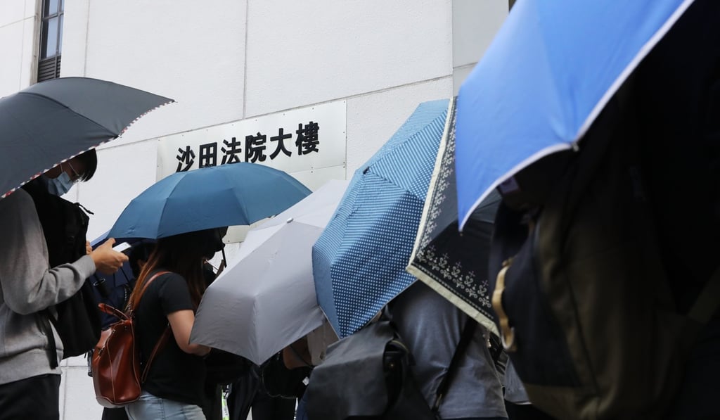 People gather outside Sha Tin Court to offer support to five Chinese University students charged on Wednesday with rioting. Photo: K. Y. Cheng
