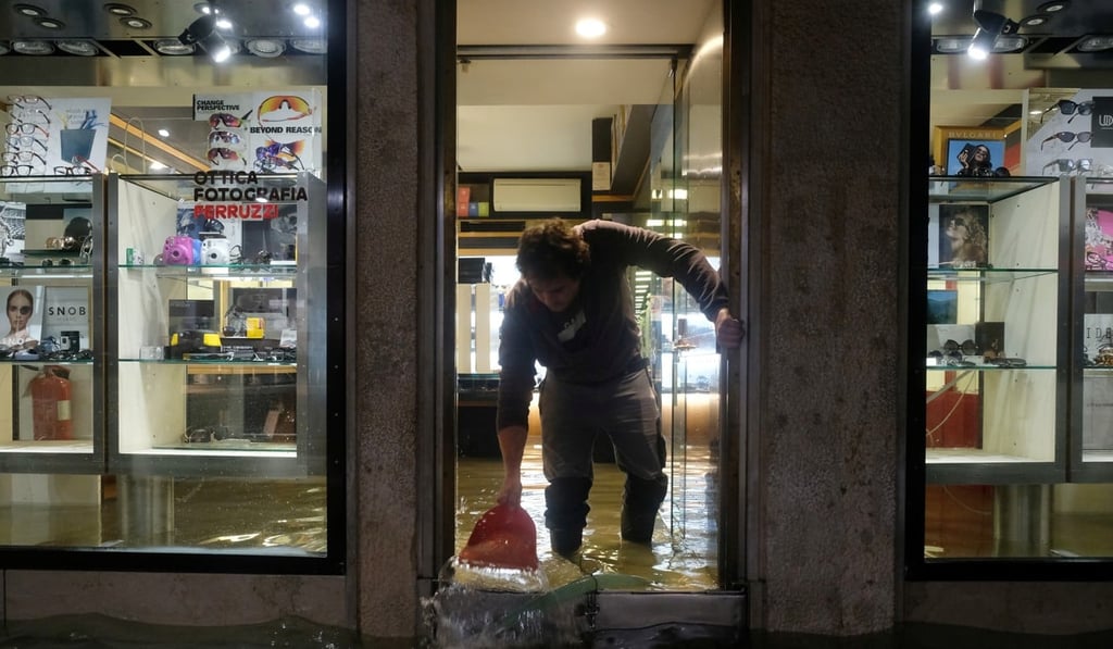 Shops and streets were put under water in Venice during an exceptional tide. Photo: Reuters