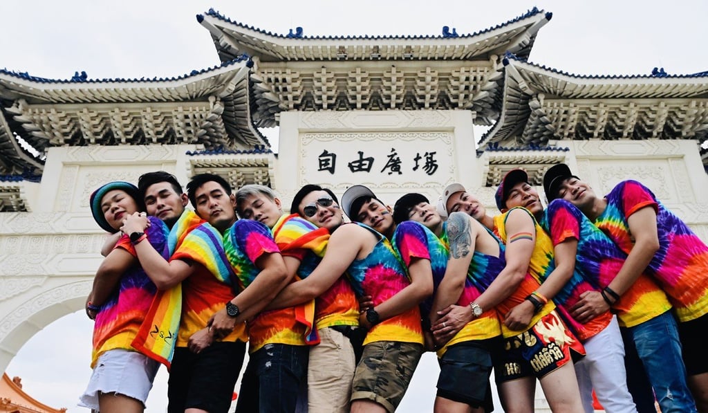 Participants from Thailand pose in front of the Chiang Kai-shek Memorial Hall as they take part in the annual Pride parade in Taipei. Photo: AFP