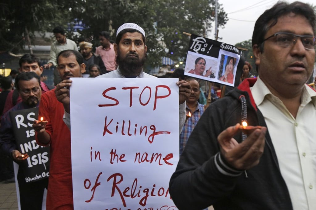 Human rights activists in Kolkata, India, take part in a march on December 8, 2017, against the killing of a Muslim man in the western state of Rajasthan. Photo: AP