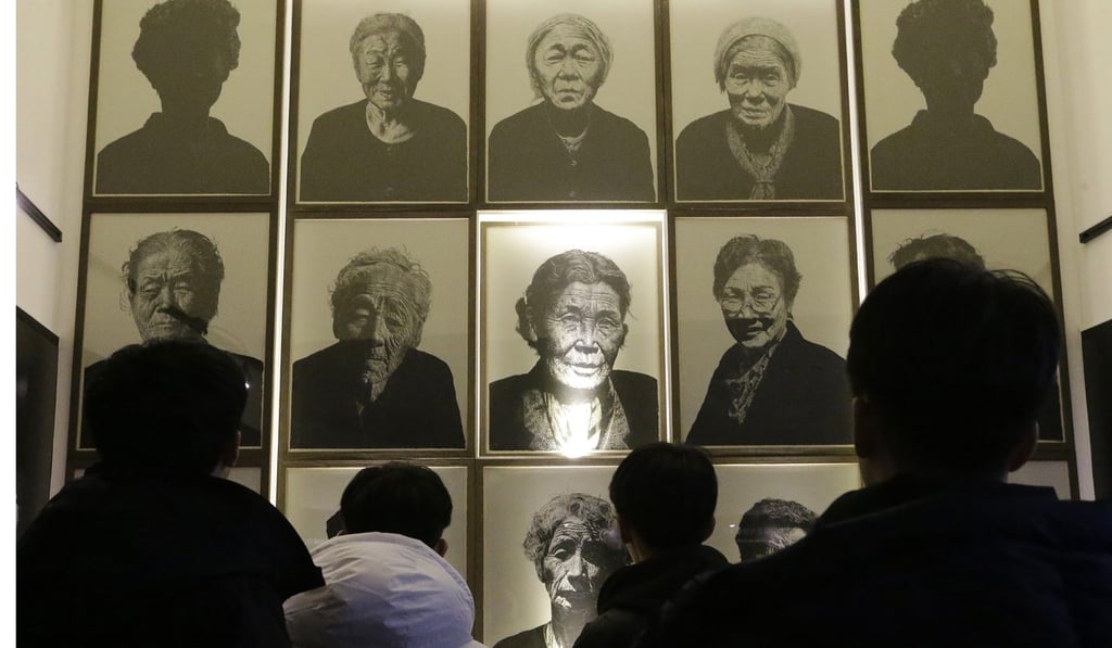 Portraits of former sex slaves, now deceased, who were forced to serve for the Japanese army during World War II. Photo: AP