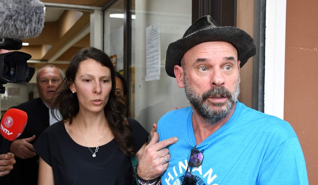 Guy Laliberte, right, speaks to the press as he leaves the courthouse of Papeete, French Polynesia. Photo: AFP Guy Laliberte, right, speaks to the press as he leaves the courthouse of Papeete, French Polynesia. Photo: AFP