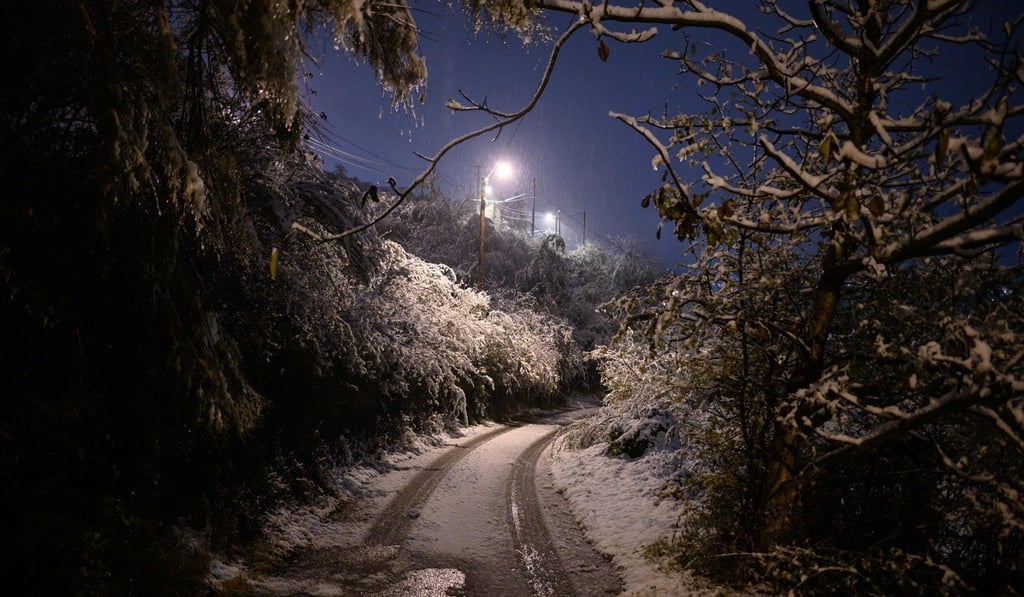A road covered in snow at Givors, near Lyon, on Friday. Photo: AFP