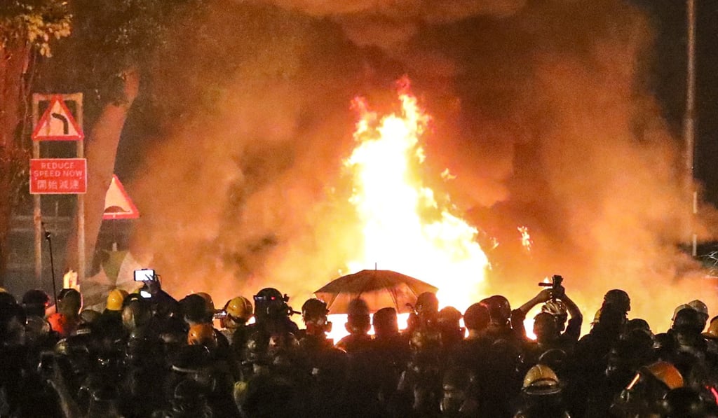Clashes break out between riot police and students at the Chinese University of Hong Kong in Sha Tin, on November 12. Photo: Felix Wong