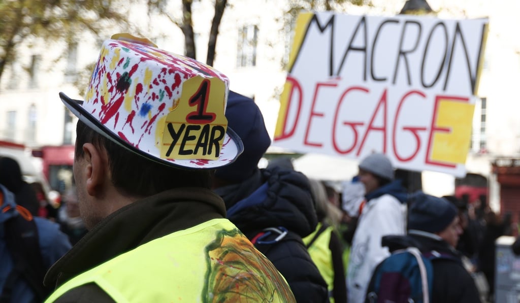 Yellow Vest protesters gather in central Paris to mark the one year anniversary of the protest movement. Photo: EPA-EFE Yellow Vest protesters gather in central Paris to mark the one year anniversary of the protest movement. Photo: EPA-EFE