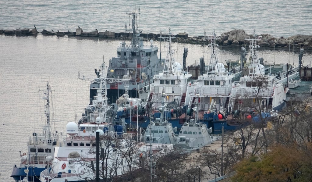 Seized Ukrainian naval ships are guarded by Russia’s coastguard vessels in the port in Kerch. Photo: Reuters Seized Ukrainian naval ships are guarded by Russia’s coastguard vessels in the port in Kerch. Photo: Reuters