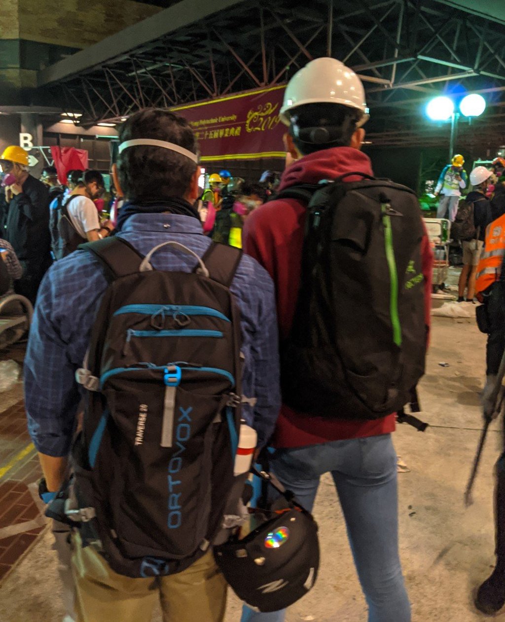 This father and son were among those refusing to leave the PolyU campus over Monday and Tuesday. Photo: Sum Lok-kei This father and son were among those refusing to leave the PolyU campus over Monday and Tuesday. Photo: Sum Lok-kei