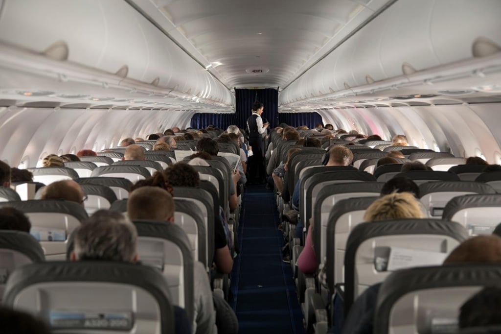 A thoughtless seatmate can make for a long airline flight. Photo: Alamy A thoughtless seatmate can make for a long airline flight. Photo: Alamy