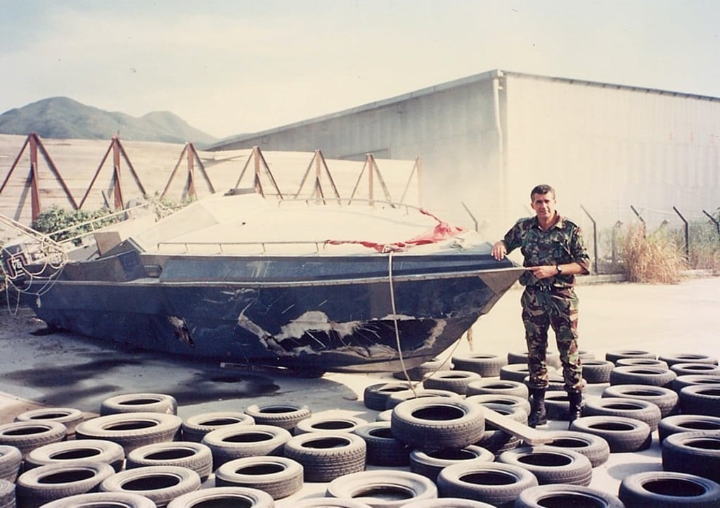 Bird stands beside a captured ‘dai fei’ speedboat, circa 1990. Photo: SCMP