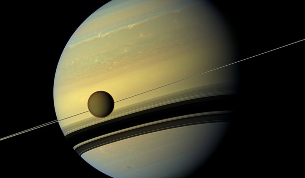 A view of Titan and Saturn as photographed from Nasa’s Cassini spacecraft in August 2012. Photo: Nasa via AFP A view of Titan and Saturn as photographed from Nasa’s Cassini spacecraft in August 2012. Photo: Nasa via AFP