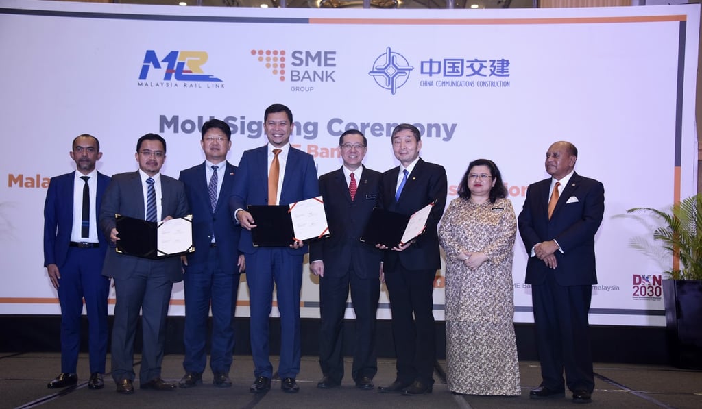 Officials, including Malaysia's Finance Minister Lim Guan Eng and Chinese ambassador to Malaysia Bai Tian attend the signing ceremony. Photo: Handout