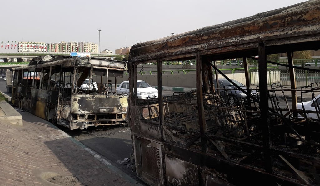 This photo released by the Iranian Students’ News Agency shows scorched public buses that remained on the street after protests that followed authorities’ decision to raise petrol prices. Photo: ISNA via AP This photo released by the Iranian Students’ News Agency shows scorched public buses that remained on the street after protests that followed authorities’ decision to raise petrol prices. Photo: ISNA via AP