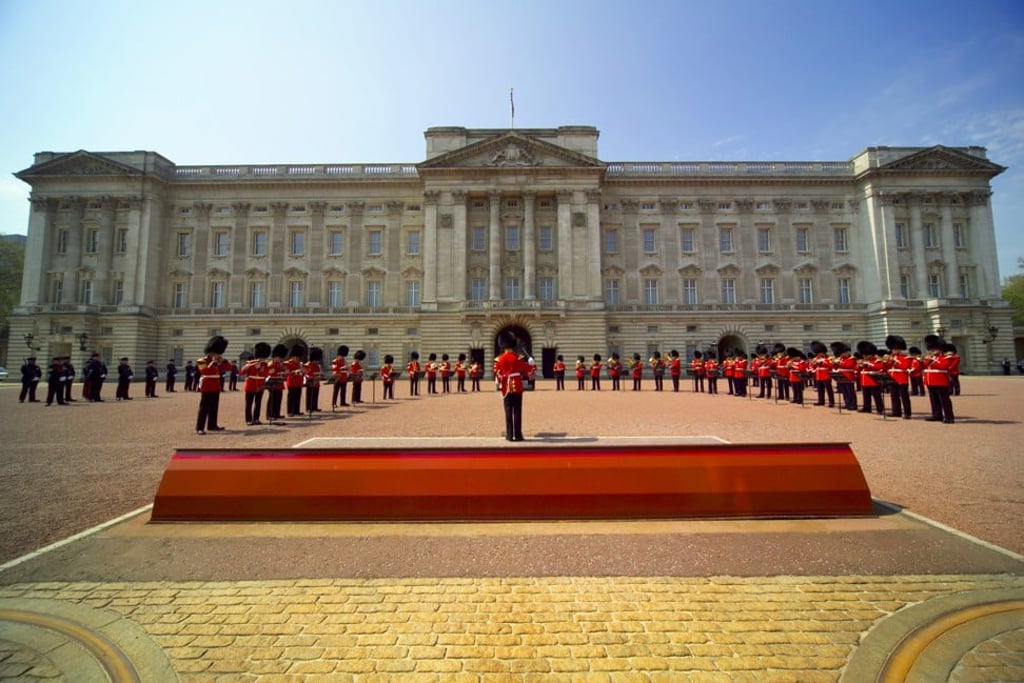 The Changing of the Guard ceremony in the courtyard of Buckingham Palace, Westminster, London.