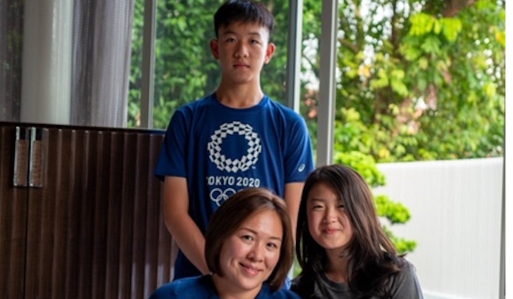 June Lim with her children Russell and Sophie in Singapore.