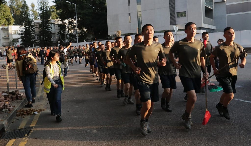 Soldiers from the People’s Liberation Army are already in Hong Kong. Just last Saturday, they helped clear the roadblocks in Kowloon Tong near Baptist University. Photo: Edmond So Soldiers from the People’s Liberation Army are already in Hong Kong. Just last Saturday, they helped clear the roadblocks in Kowloon Tong near Baptist University. Photo: Edmond So