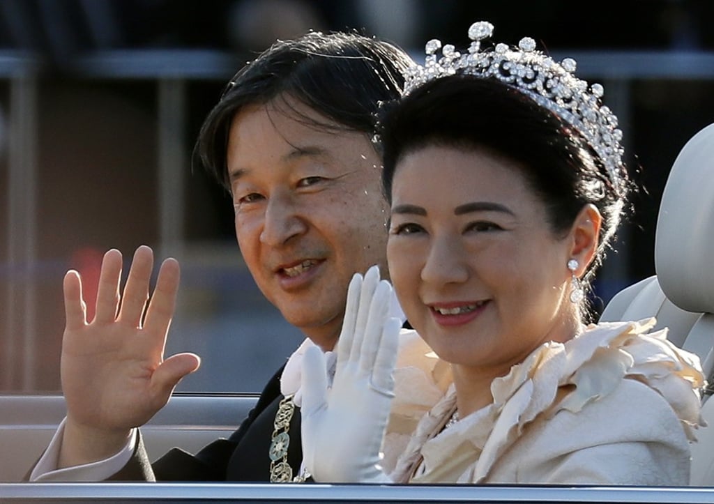 Japan's Emperor Naruhito and Empress Masako wave to well-wishers during their parade in Tokyo, Japan, on November 10, 2019, after he was officially proclaimed Emperor of Japan on 22 October 2019. Photo: EPA-EFE
