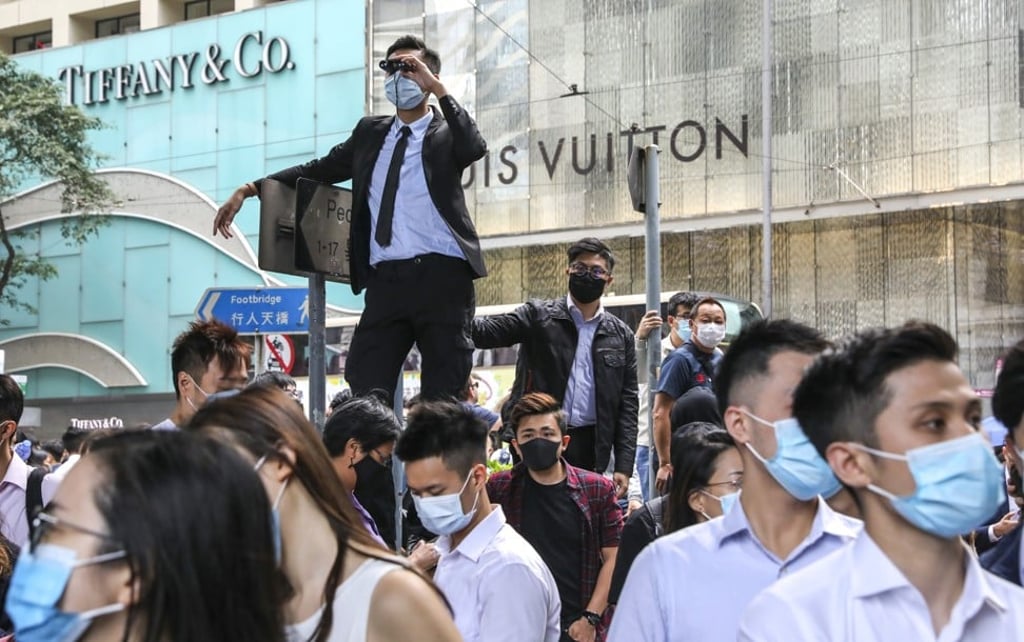 Pro-democracy protesters outside the Tiffany store in Hong Kong’s Central district have not been good for business. Photo: K.Y. Cheng