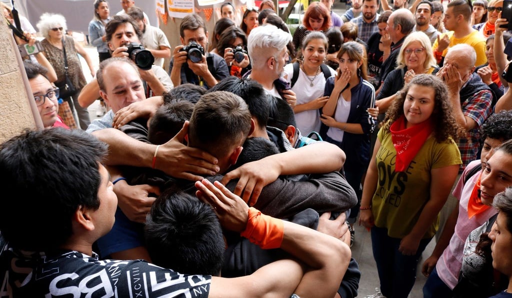 Relatives, friends and support groups react after the hearing in Mendoza, Argentina on Monday. Photo: EPA-EFE