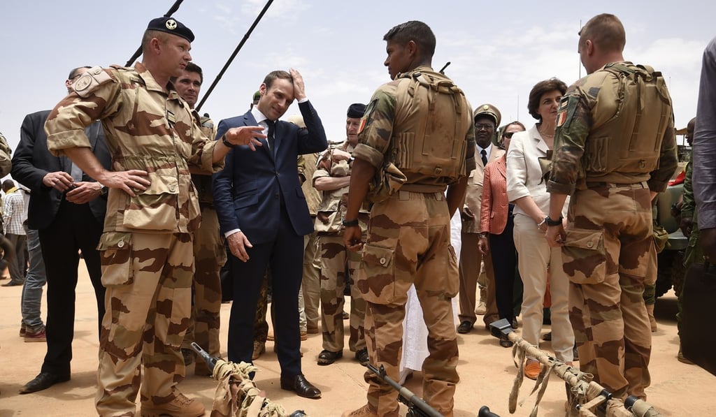 French President Emmanuel Macron visiting soldiers of Operation Barkhane, France’s largest overseas military operation, in Gao, northern Mali. Photo: AP French President Emmanuel Macron visiting soldiers of Operation Barkhane, France’s largest overseas military operation, in Gao, northern Mali. Photo: AP