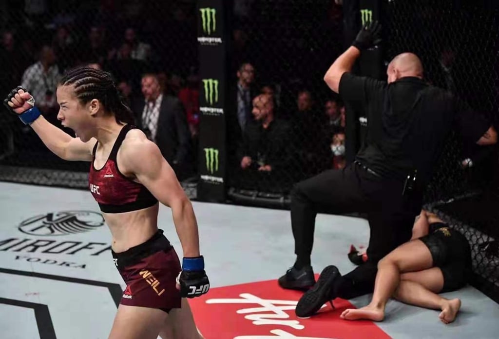 Zhang Weili walks off after beating Jessica Andrade in Shenzhen. Photo: Brandon Magnus/Zuffa LLC