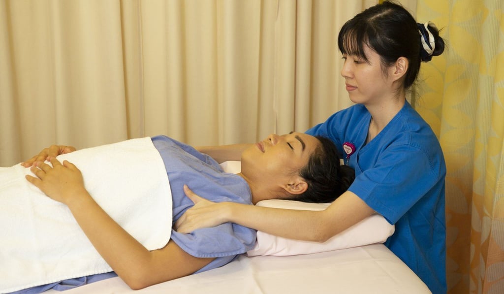 Staff at Hong Kong Adventist Hospital – Stubbs Road’s Rehabilitation Centre offer a specialised lymphatic massage – one of the effective post-surgery therapies available for breast cancer survivors – which helps move excess fluid causing pain and swelling in body tissue in the arms. Photo: Frank Freeman