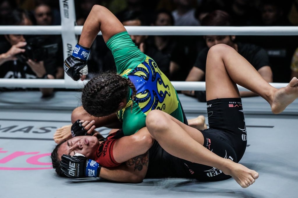 Michelle Nicolini punches Angela Lee on the ground. Photo: One Championship